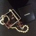 CHANEL Колье и серьги с логотипом и бирюзой CHANEL Колье и серьги с логотипом и бирюзой