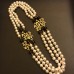 CHANEL  Ожерелье "Лого с бордовыми бусинами"
