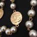 CHANEL Ожерелье "Жемчужное с логотипом" CHANEL Ожерелье "Жемчужное с логотипом"